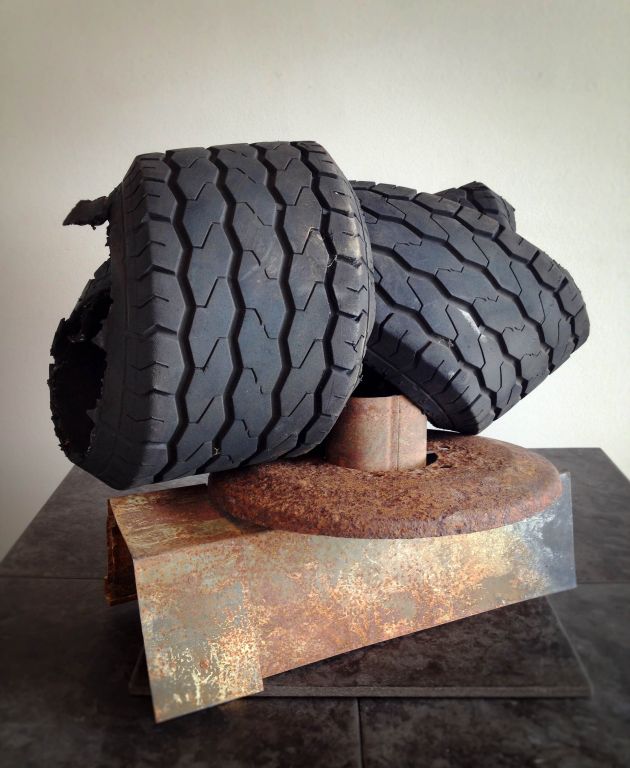 Twist front view, altered tire piece and metal, 14"H x 20"W x 12"D